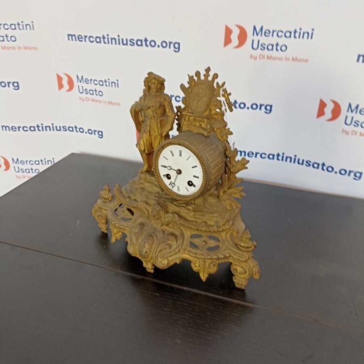 Orologio da camino in antimonio dorato
