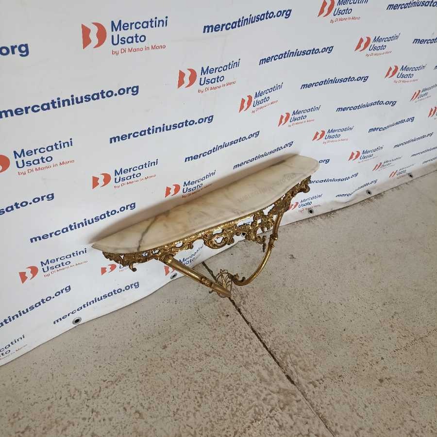 Consolle dorata da parete in stile